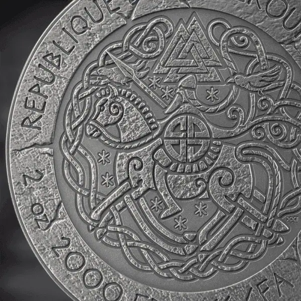 Intricate Celtic coin design featuring Viking symbols and historical inscriptions, representing luxury and heritage.