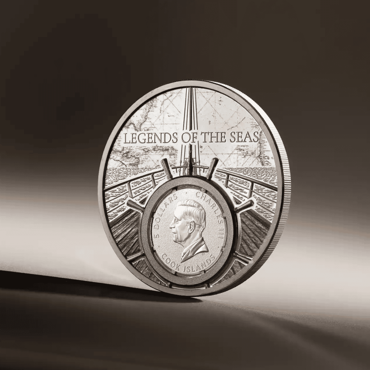 Intricate silver coin featuring the ship 'Santa Maria' with a historic map in the background, part of the Legends of the Seas series.