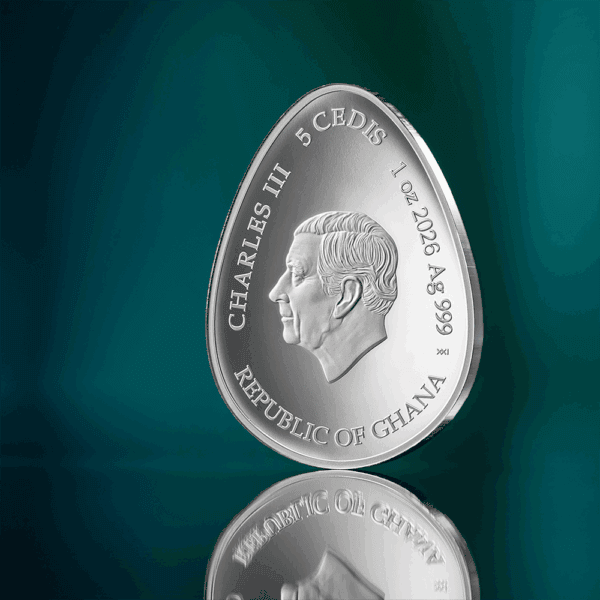 Shiny Ghana coin featuring a portrait of Charles III, symbolizing Ghanaian currency and heritage.