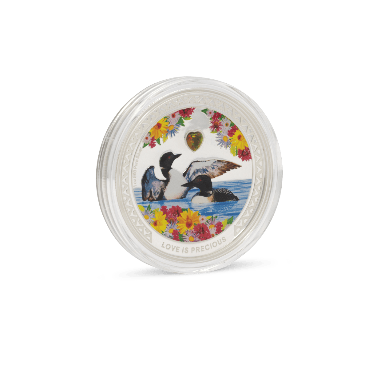 Colorful collectible coin featuring ducks swimming in a pond with vibrant floral border and the inscription "LOVE IS PRECIOUS".