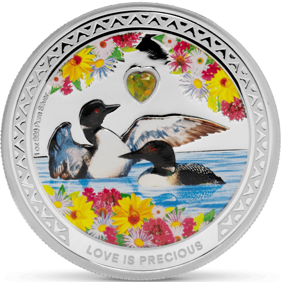 Colorful collectible silver coin featuring two ducks swimming in water, surrounded by vibrant flowers and a heart-shaped gemstone, with engraved text "LOVE IS PRECIOUS".