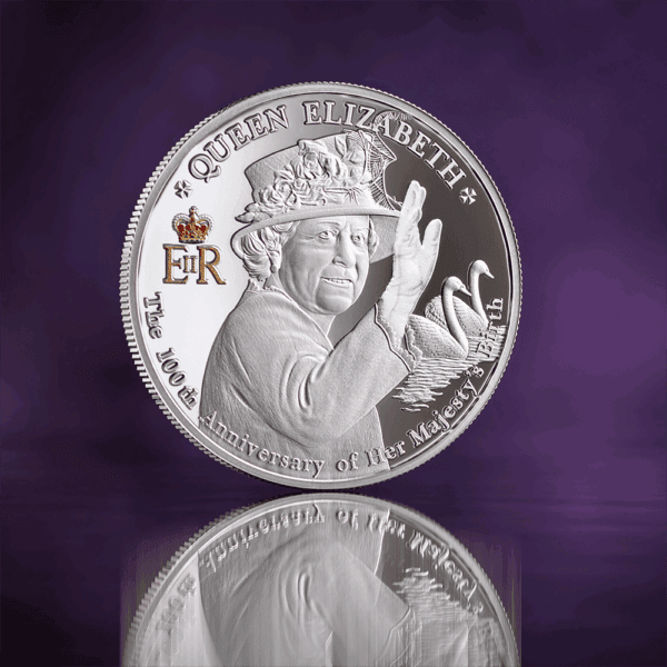 Shiny commemorative coin celebrating Queen Elizabeth's 100th anniversary with detailed design and swan imagery.