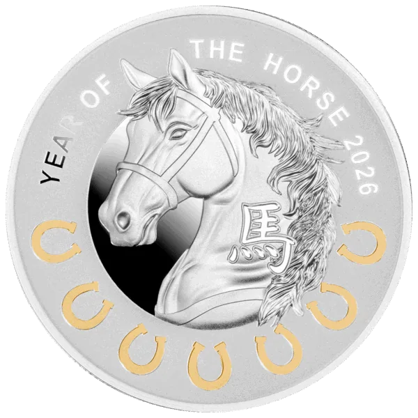 Elegant silver coin featuring a detailed engraved horse head with a bridle, commemorating the Year of the Horse 2026, with decorative gold accents and a circular inscription around the edge.