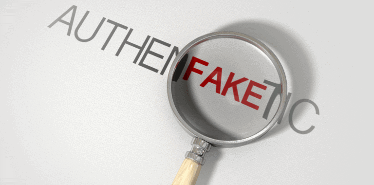 Suspicious magnifying glass focusing on the word "FAKE" with "AUTHENTIC" crossed out, symbolizing fake vs. genuine content.