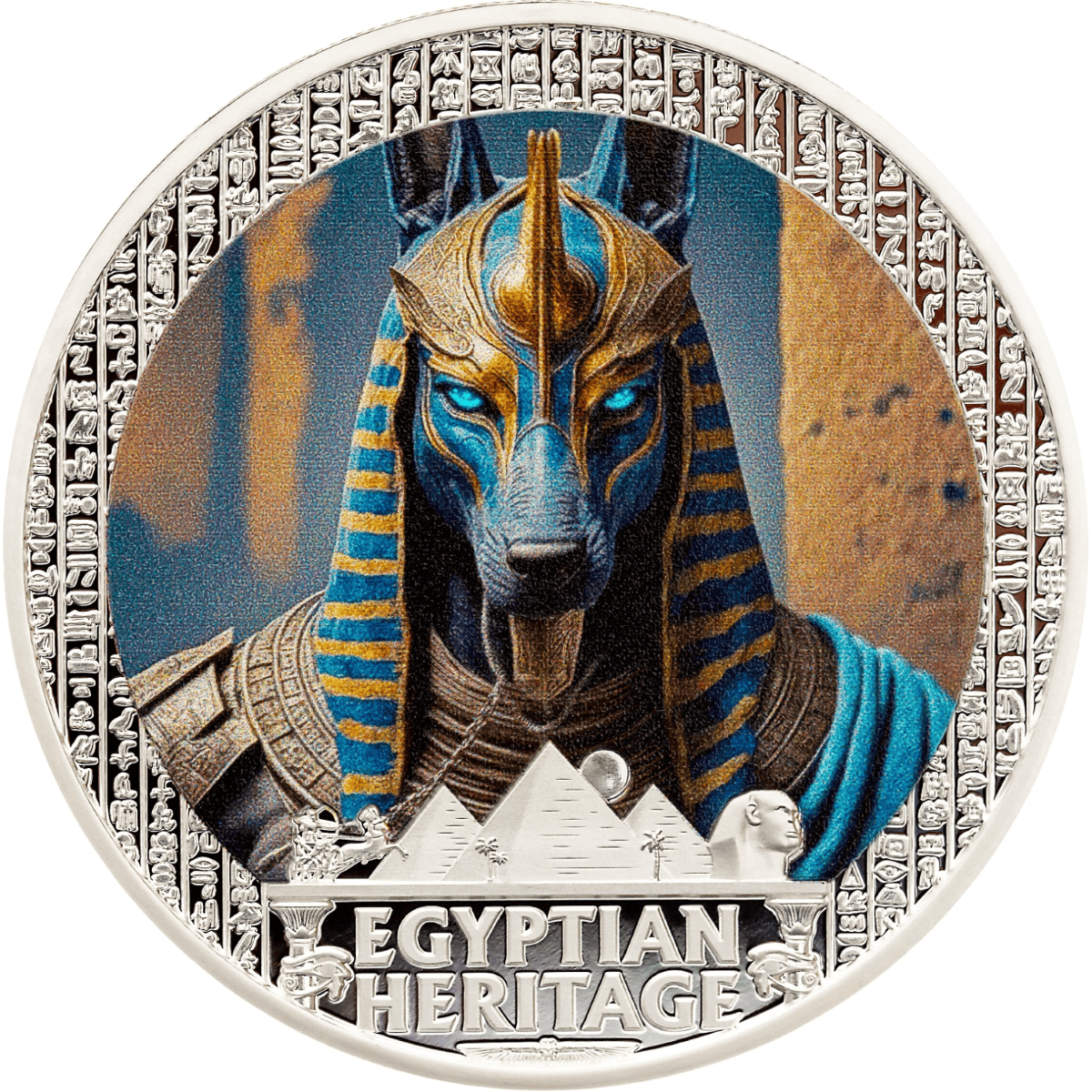 Ancient Egyptian-style silver coin featuring Anubis, decorated in colorized detail with hieroglyphic border and Egyptian motifs.