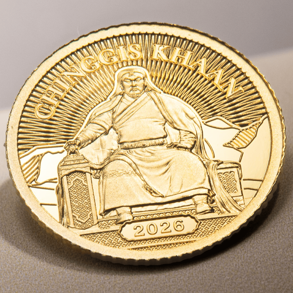 Shiny gold coin, front view, 2026, Cook Islands mint, 0.5g weight, featuring Chinggis Khaan, ideal for collectors a.