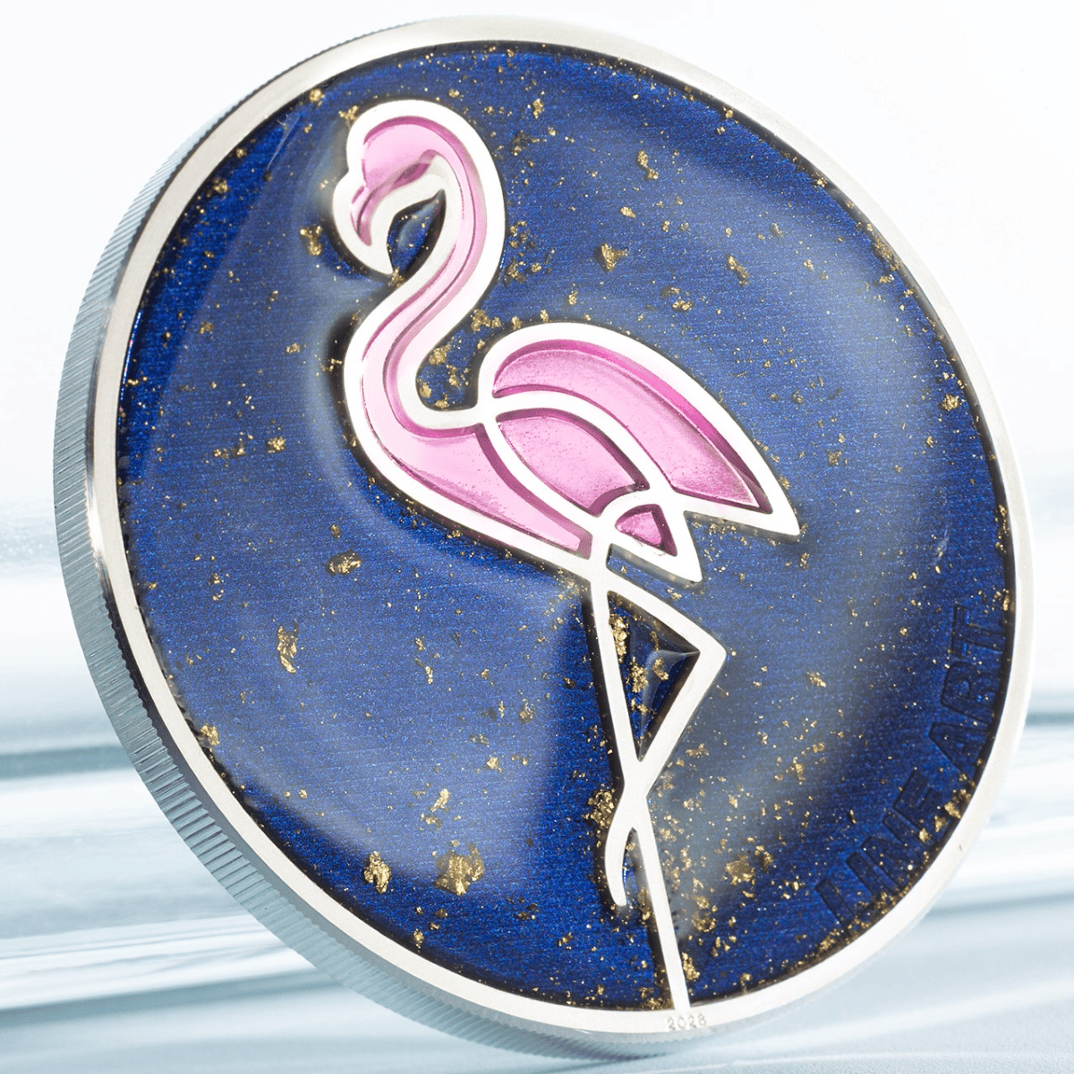 Side view of 2026 Cook Islands flamingo silver proof coin, 1 oz, minted by GR Reserve, featuring colorful flamingo.