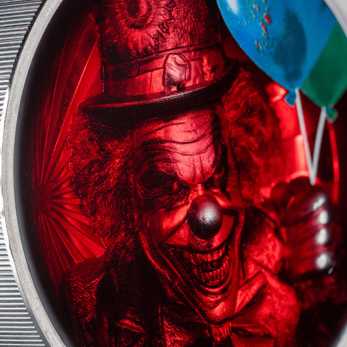 Oblique view of 2026 Cook Islands silver coin featuring a colorful clown with a red background, 2 oz weight, minted.