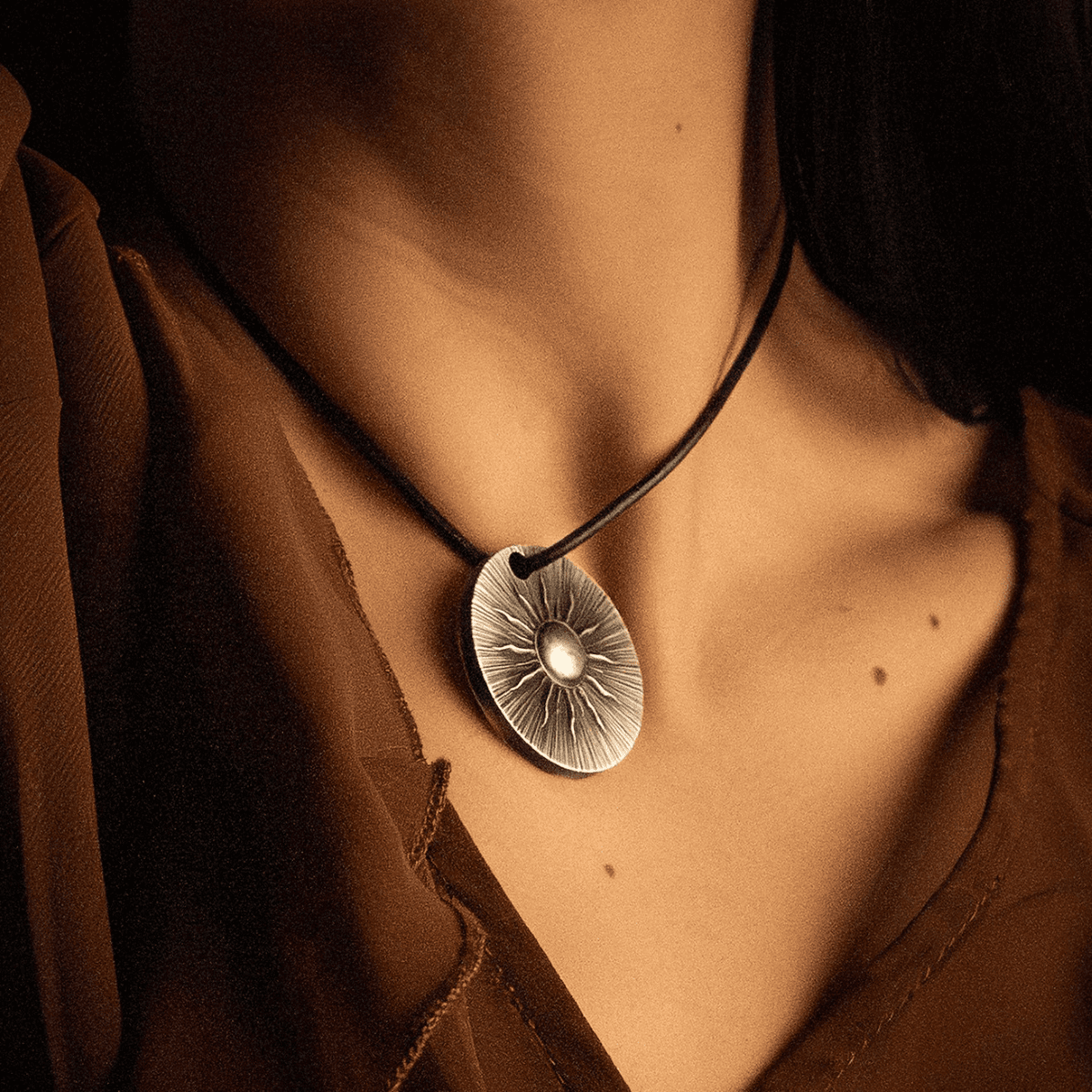 Intriguing angle of the 2026 Cook Islands Talisman Luminara 1 oz Silver Antiqued Coin, minted by GR Reserve, showca.