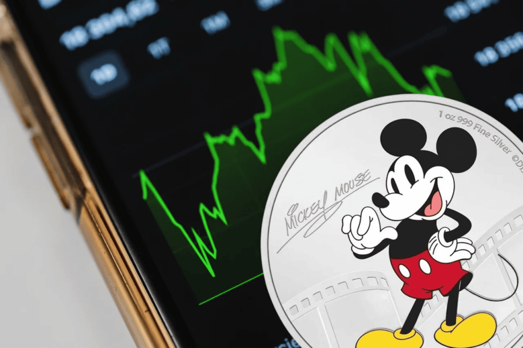 Shallow angle view of a Disney Mickey Mouse precious metal coin, minted in 2023 by the US Mint, weighing 1 oz, feat.