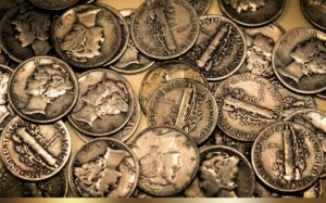 Old United States Liberty Dimes coins showcasing a collection of US Mint history.