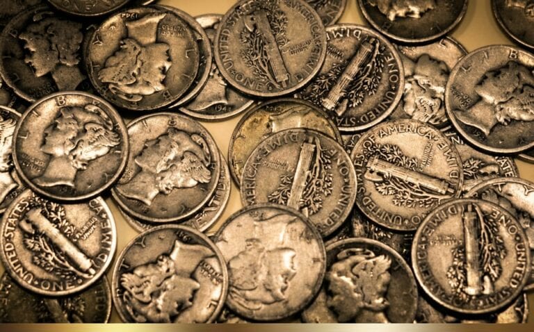 Old United States Liberty Dimes coins showcasing a collection of US Mint history.