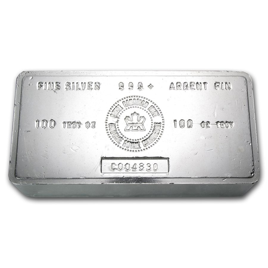 Bright angle view of 100 oz Royal Canadian Mint Silver Bar, 2023, featuring the iconic Royal Canadian Mint logo and.