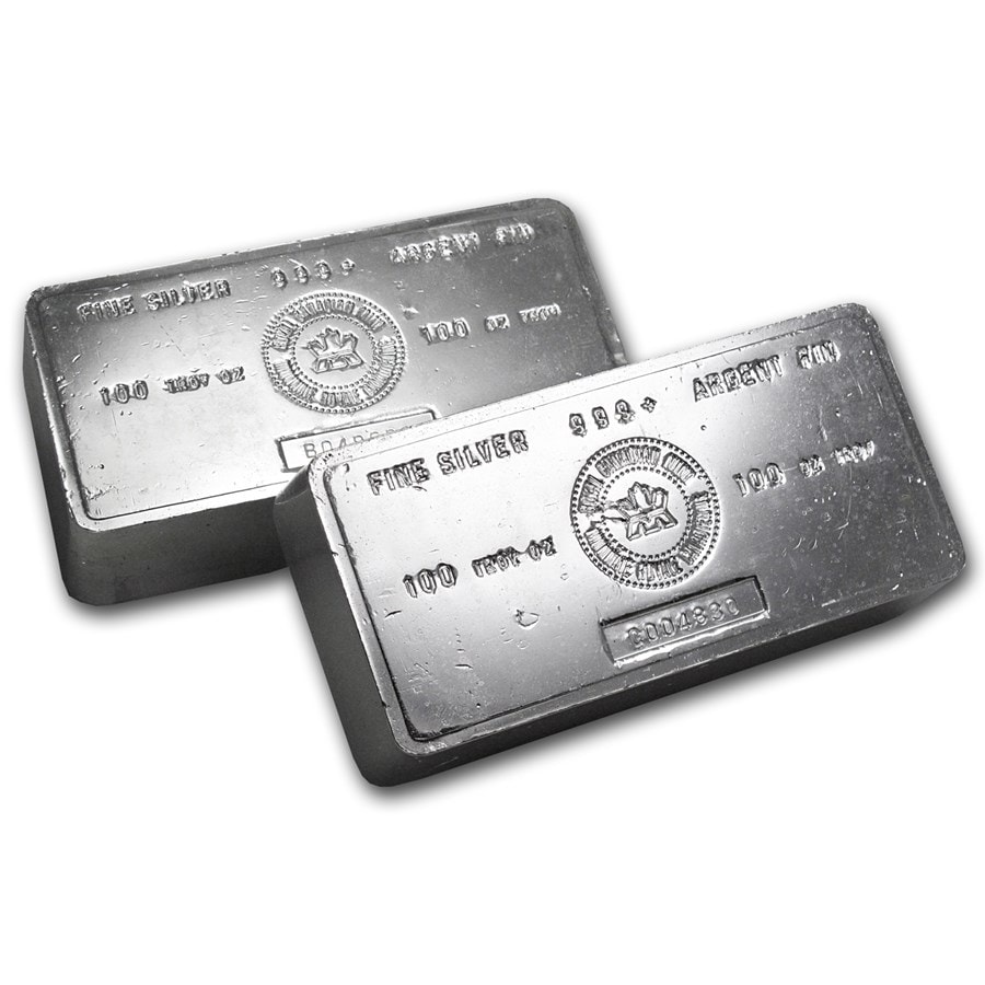 Shiny 100 oz Royal Canadian Mint silver bar, side angle, 2023, made by Royal Canadian Mint, featuring a sleek, rect.