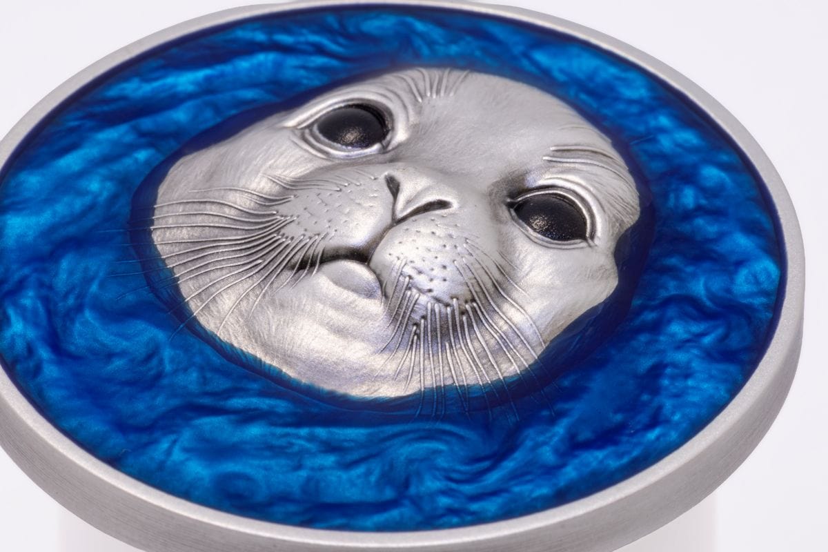 Intriguing close-up of a silver coin featuring a detailed seal face, 2026, minted by the Cameroon mint, 1 oz weight.