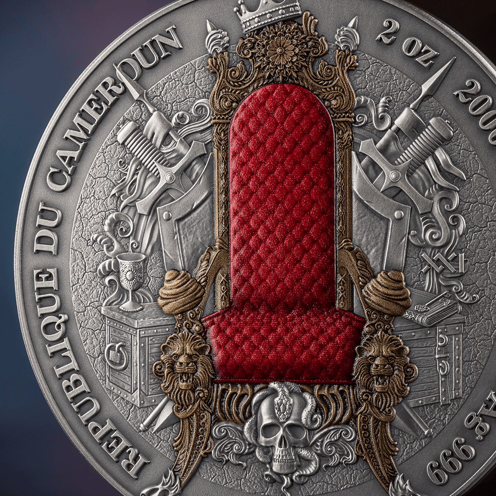A regal 2 oz silver coin featuring a detailed throne with red velvet upholstery, minted in 2006 by the Cameroon min.