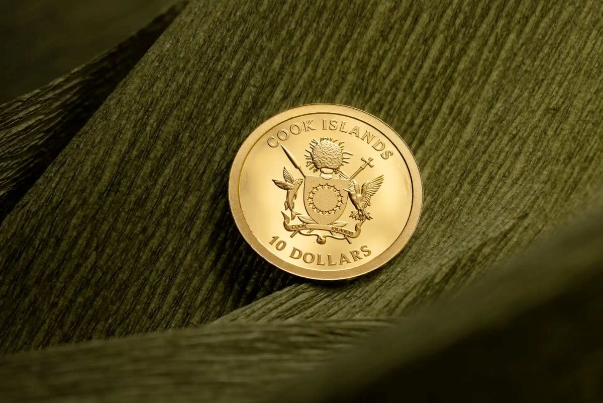 Shiny gold Cook Islands 2026 coin, 1g weight, minted by GR Reserve, featuring a four-leaf clover design, perfect fo.