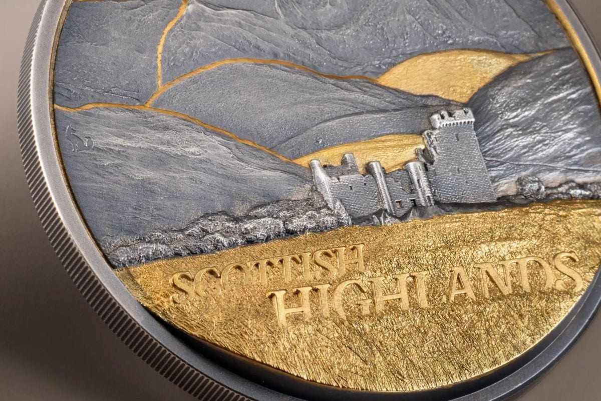 The Scottish Highlands 2026 silver coin, minted by the Cook Islands, features a detailed landscape with a castle, w.