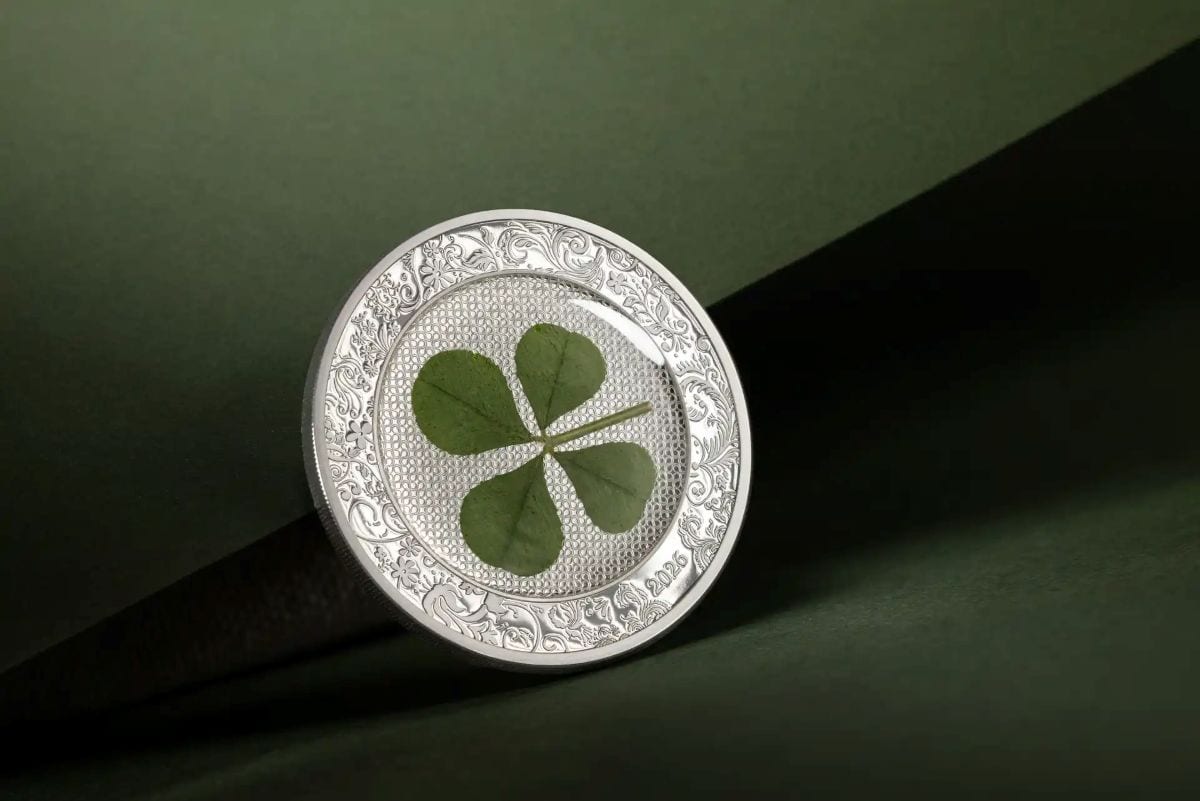 Shiny silver coin, 2026 Cook Islands Ounce of Luck, 1 oz weight, colorized proof, captured from a top angle showcas.