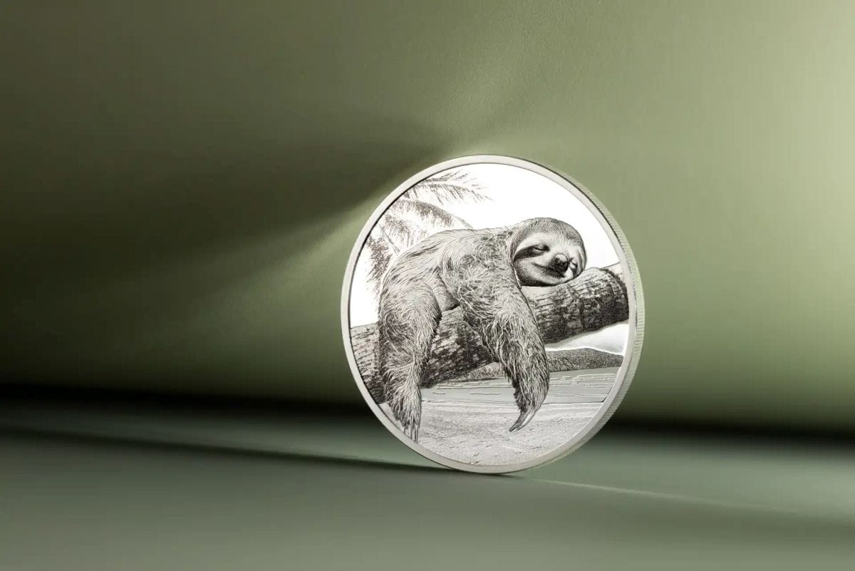 Sloth coin, 2026, Cook Islands Mint, 1 oz silver, colorized proof, from a side angle showcasing detailed design and.