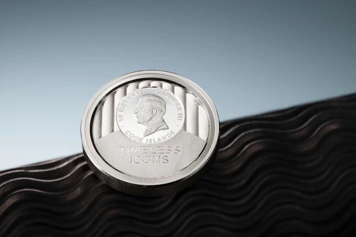 Close-up of 2026 Cook Islands Timeless Icons Statue of Liberty 2 oz silver coin, angled view, colorized proof, with.