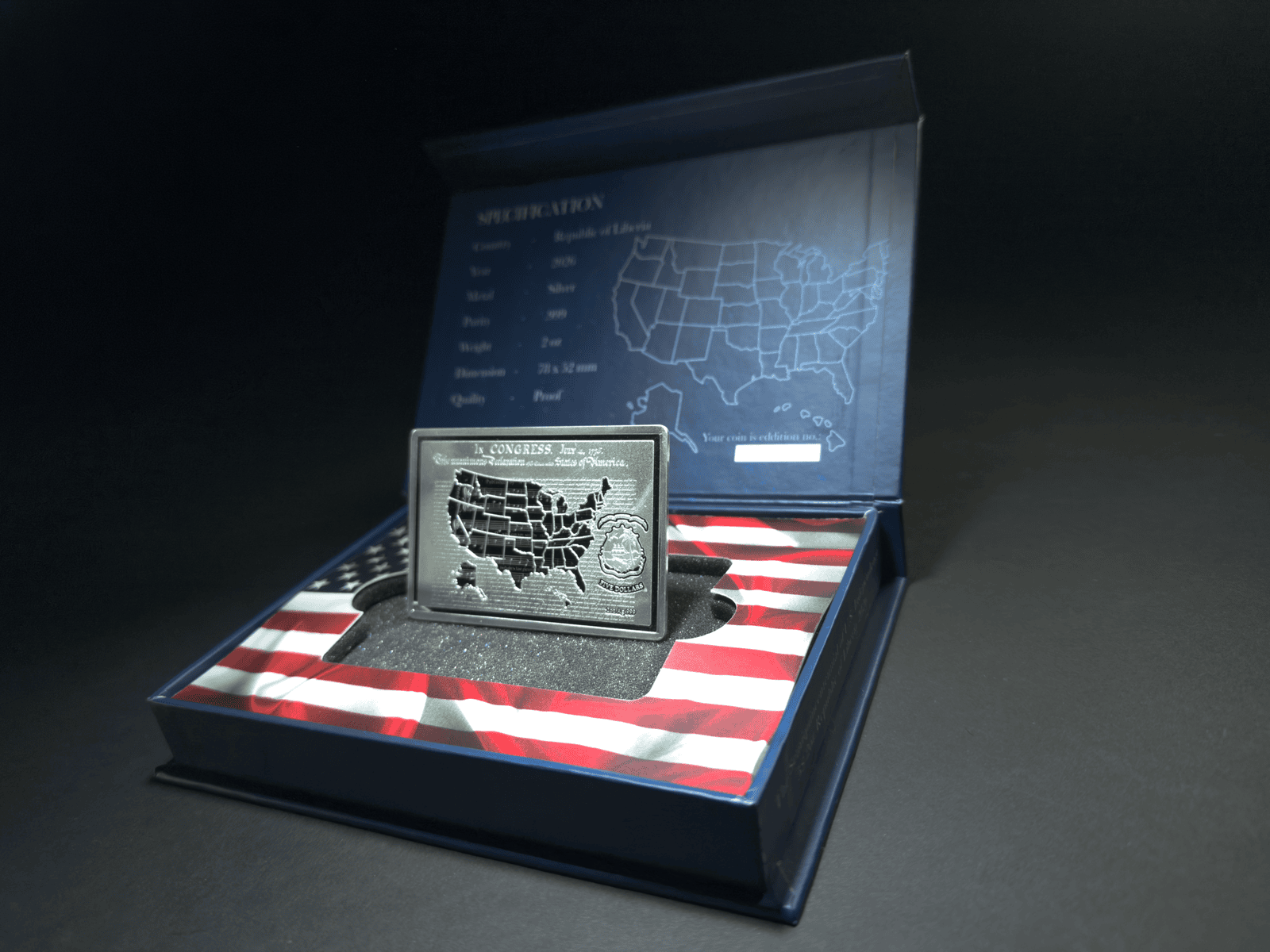 Close-up of 2026 Liberia 250th Anniversary US Independence silver proof bar, 2 oz, minted by GR Reserve, angled vie.
