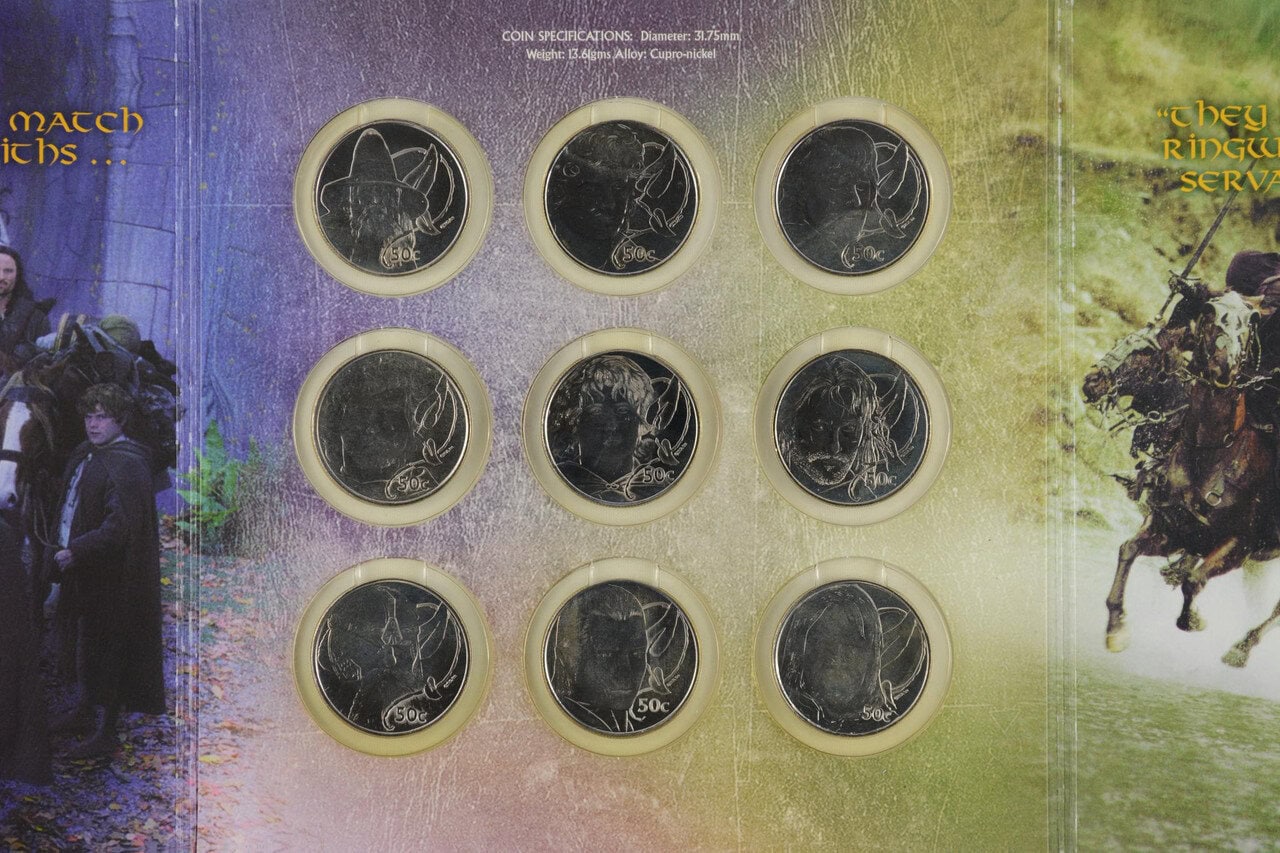 2003 New Zealand Mint Lord of the Rings Scenes in Silver nine-coin presentation case showing the silver proof coin grid with Aragorn and Riders of Rohan illustrated wraparound art