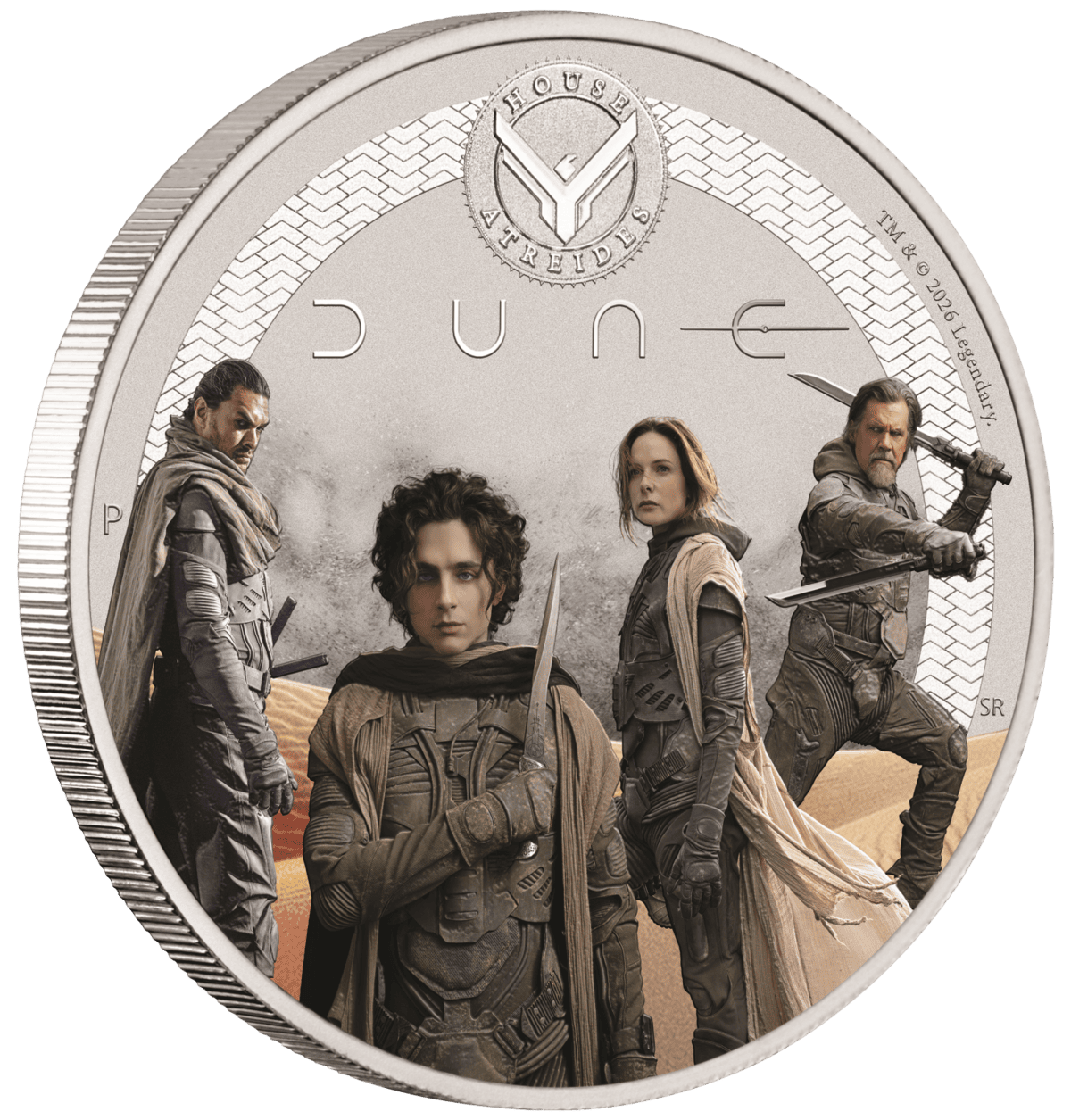 Angled view of the colorized House Atreides coin showing the reeded edge alongside the character design