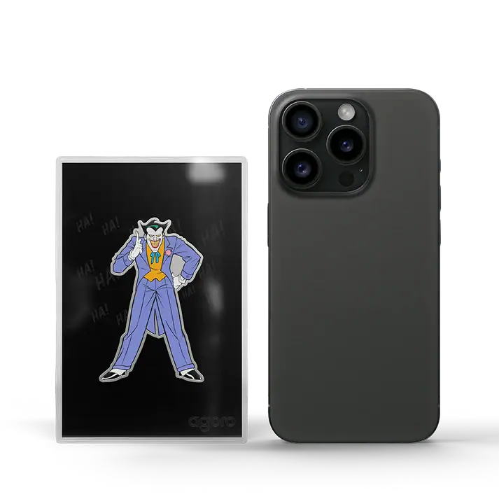2026 Agoro Joker 1/2 oz shaped silver collectible in its holder, colorized Joker in a purple suit with one finger raised