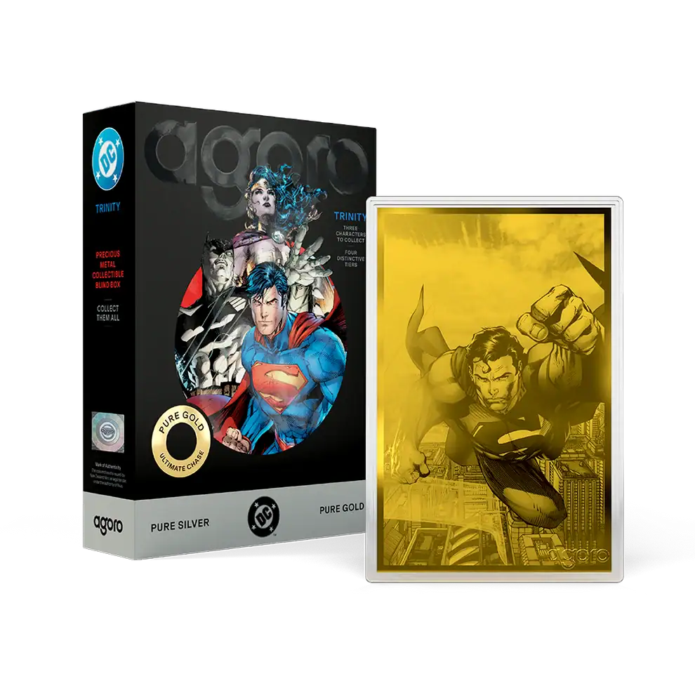 Agoro DC Trinity gold-colored foil in capsule, engraved Superman flying over city towers, beside the blind box