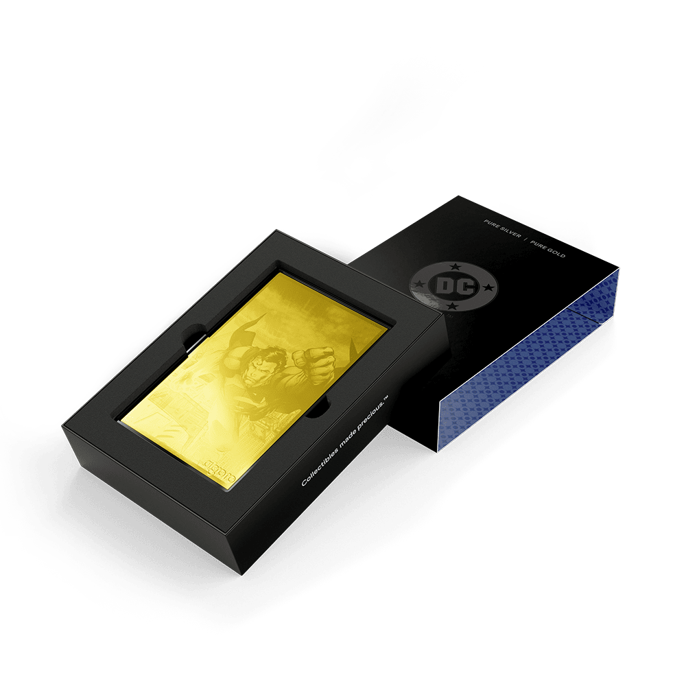 Agoro DC Trinity box opened, gold-colored foil of a flying Superman in a black tray beside the DC logo sleeve