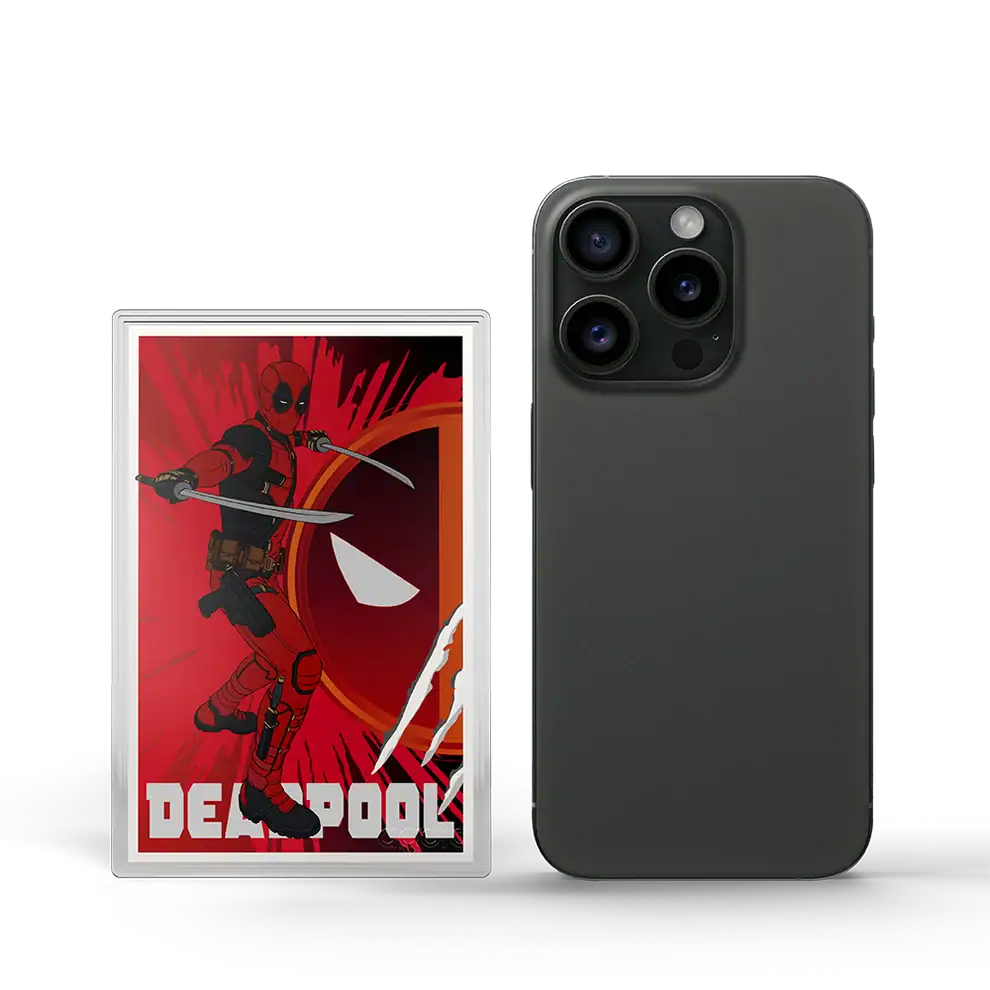 Agoro Marvel Deadpool 5g silver foil in a capsule beside a smartphone for scale, red Deadpool poster art