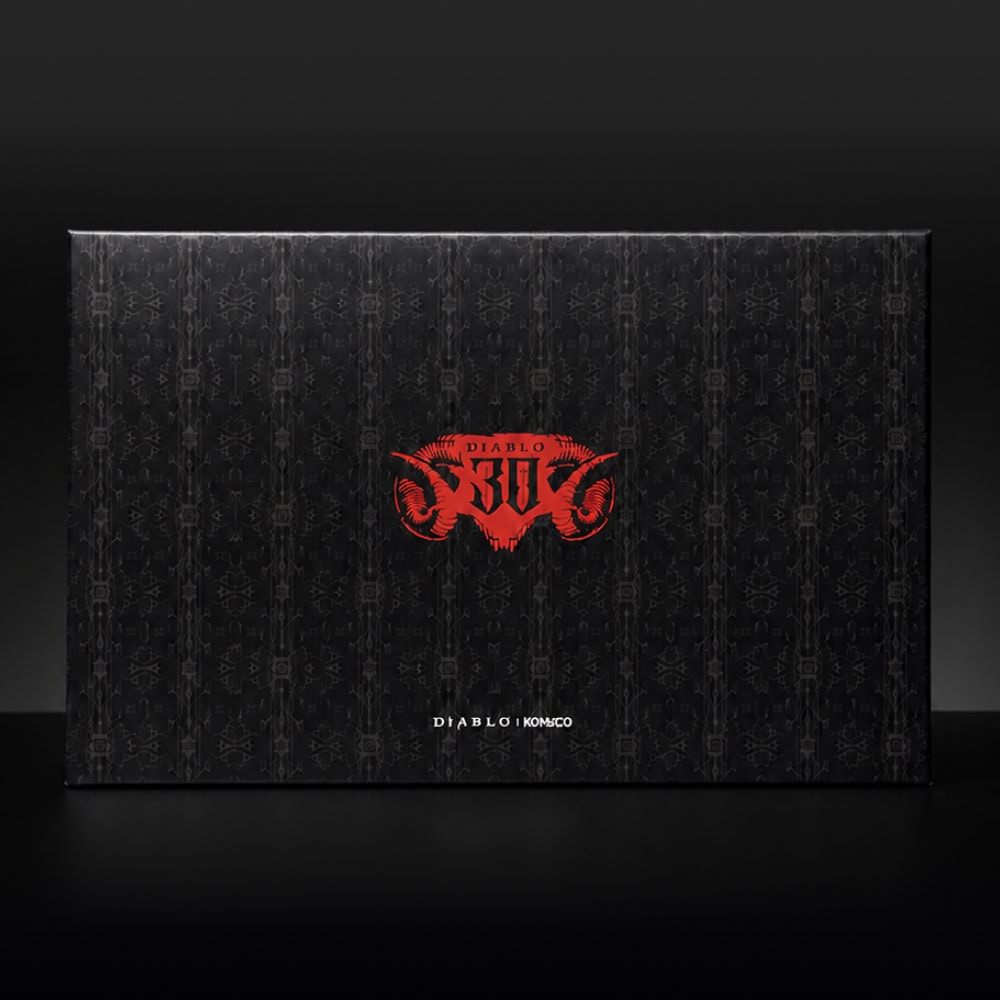 Diablo 30th Anniversary intaglio print box, front with a red horned DIABLO 30 emblem on a black patterned lid